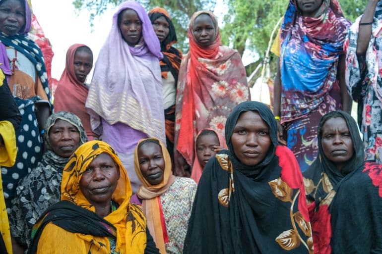 Some Sudan women who are fleeing the war in an unofficial camp in South Sudan. Photo: Virginia Pietromarchi/Al Jazeera