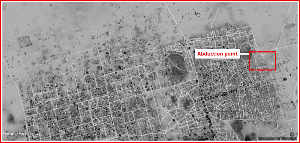Satellite view of a town with streets, buildings, and a highlighted "Abduction point."