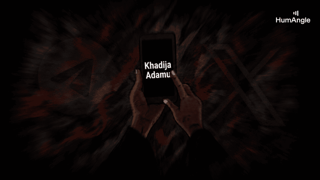 Hands holding a phone displaying text on a dark, abstract background with red and black hues.