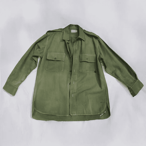 Olive green military-style shirt with buttoned front, epaulettes, and two chest pockets on a white background.