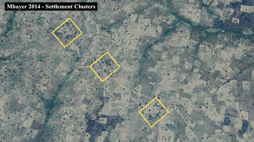 Aerial view of landscape with three yellow-outlined squares marking settlement clusters labeled "Mbayer 2014 - Settlement Clusters."