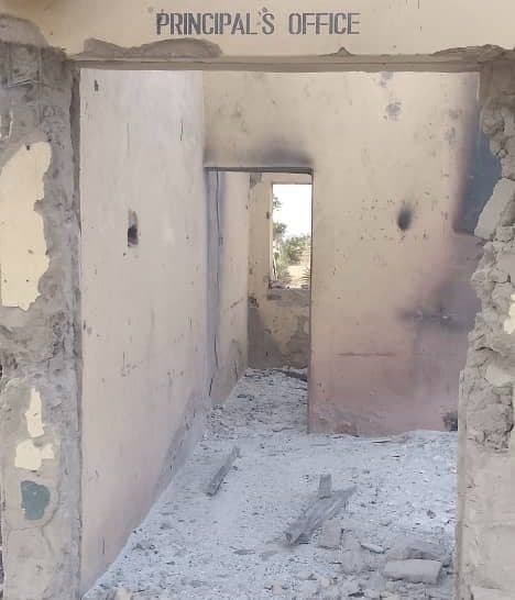 The image shows a dilapidated "Principal